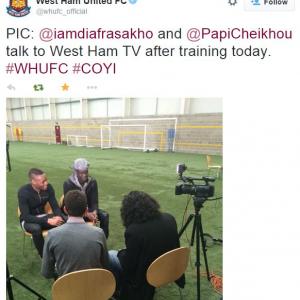 Marc Joss, French consecutive interpreter with West Ham's Cheikh Kouyaté and Diafra Sakho as seen on the official West Ham United Twitter account, football interpreter